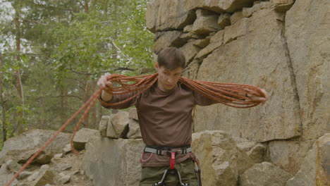 climber at the bottom of the cliff