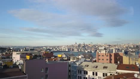 istanbul, turkey, flying above residential buildings toward bosporus, aerial cityscape view