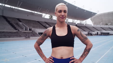 young athlete standing alone at the track