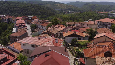 reveal of distant hills surrounding the medieval city of veliko tarnovo hillside