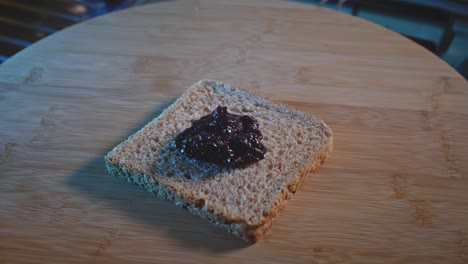 whole wheat bread with blueberry jam spread