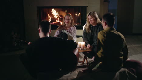 friends gathering by the fireplace