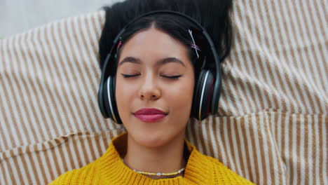 woman relaxing with headphones