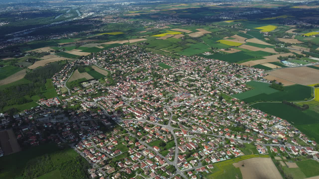 Aerial View of a French Town and Surrounding Farmland