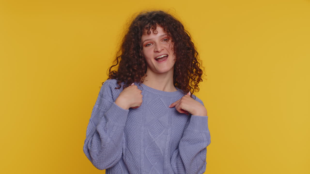 Happy woman feeling very proud pointing herself, looking self-confident, overjoyed by success