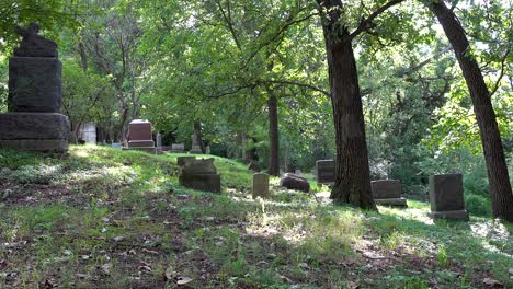 Graveyard-spooky-cemetery-with-old-tombstone-graves-panning-shot-4k