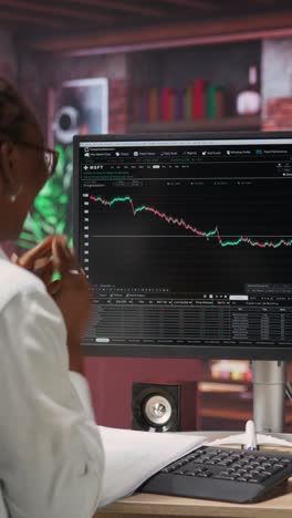 vertical video excited day trader gaining money after selling stocks