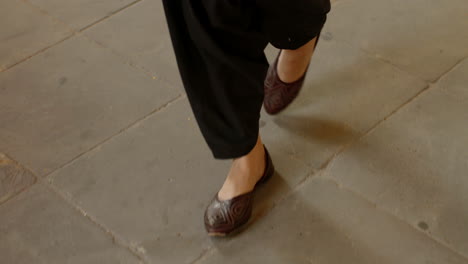 close-up of an indian woman's feet dancing and walking