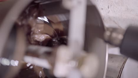 delicious liquid chocolate mixing in conching machine