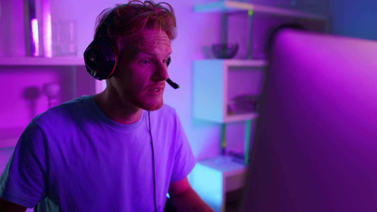 Cyber gamer talking team in headphones closeup. Gaming blogger streaming video