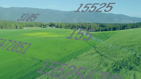 center pivot irrigation system animating across green crop fields showing numeric data overlay