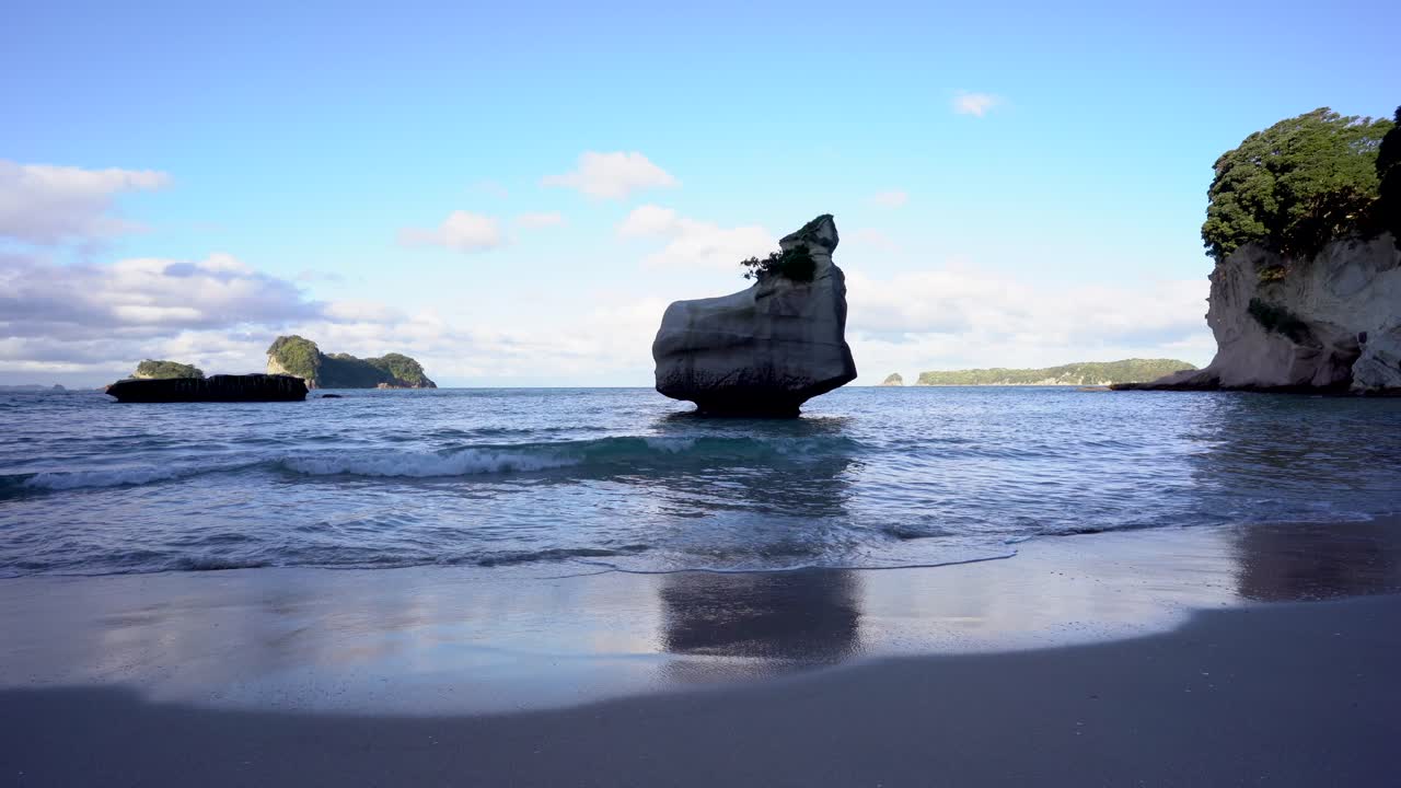 Limestone formation at Cathedral Cove in the shade
