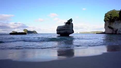 limestone formation at cathedral cove in the shade
