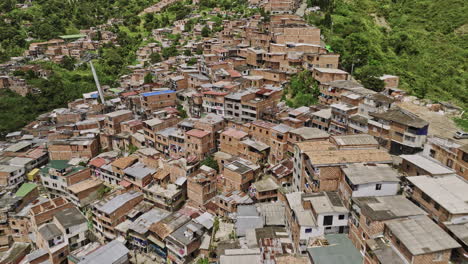 medellin colombia aerial v28 flyover juan xxiii and la quiebra capturing houses on hilly terrain, over the hill reveals santa margarita residential comuna - shot with mavic 3 cine - november 2022