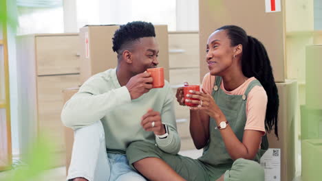Cheers,-new-home-or-happy-black-couple-with-coffee