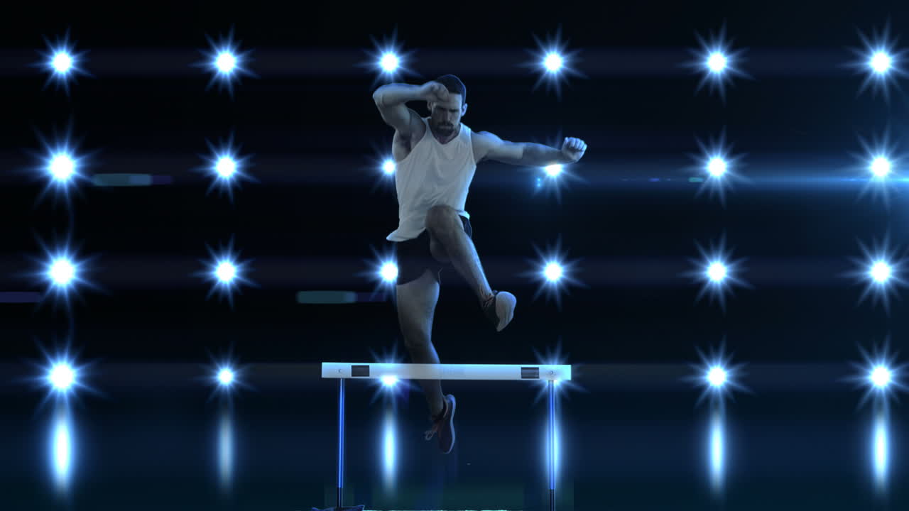 el deportista está practicando obstáculos.