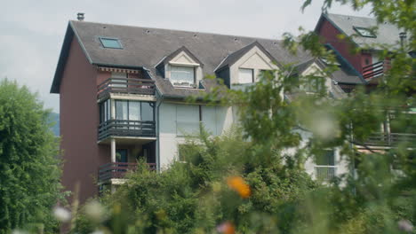 apartment building in a green setting