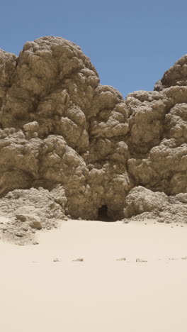 a cave in a desert mountain