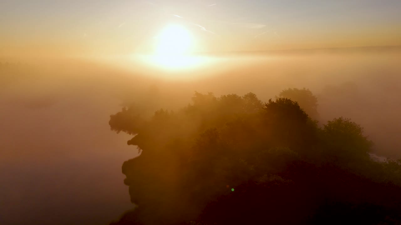 Golden Sunrise over Misty River and Forest