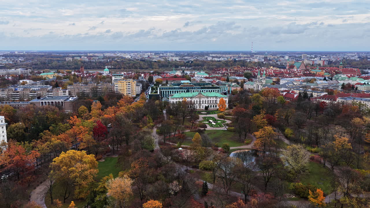 Aerial drone view of the Saxon Garden in late autumn, with panoramic views toward the historic Krasinski Palace and surrounding Srodmiescie district