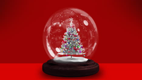 animation of snow globe over red background