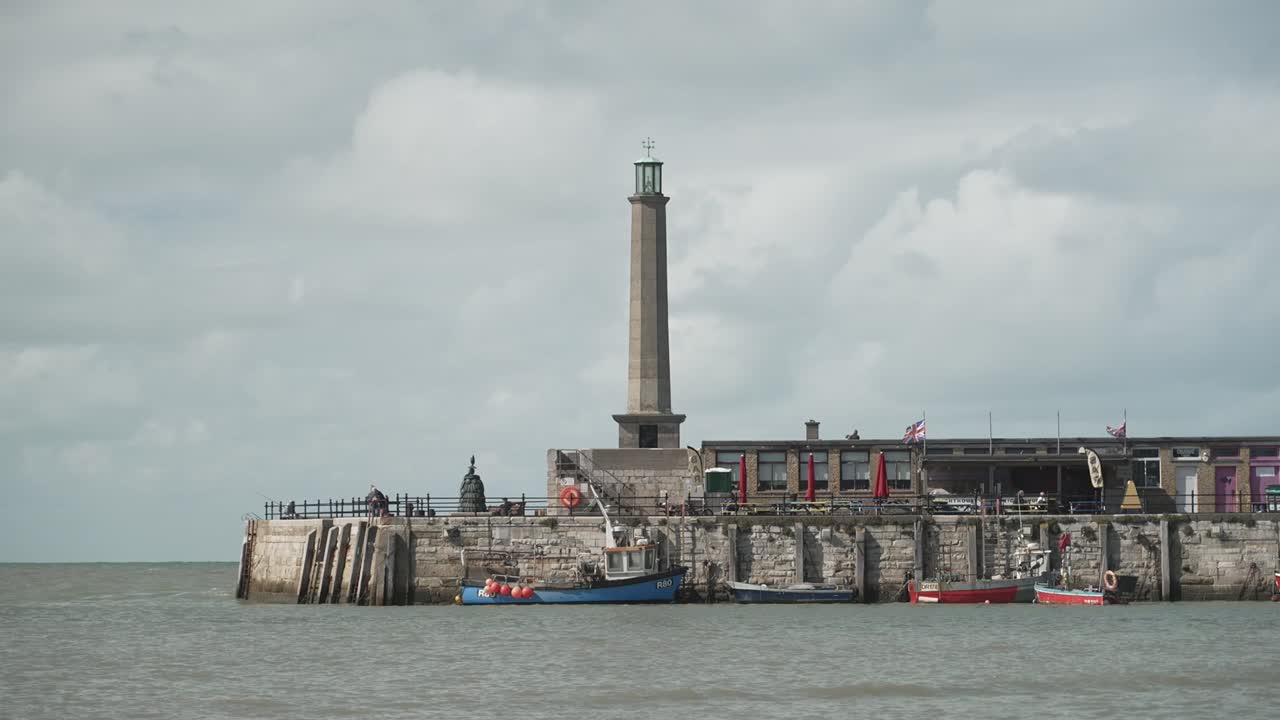 Wide shot of Margate's Harbour Arm pier by the sea