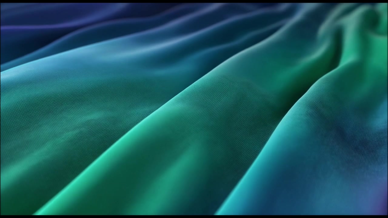 Abstract Background of Flowing Green and Blue Fabric