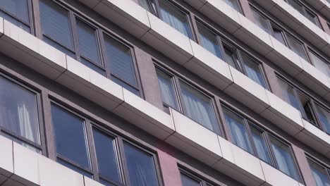 exterior of a multi-story building with many windows