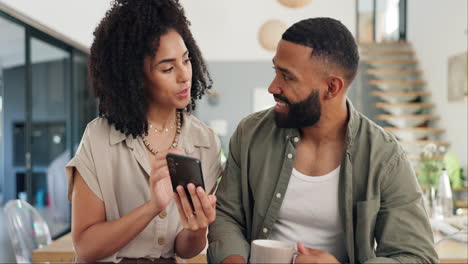 couple looking at smartphone