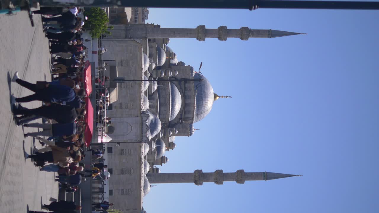 People Walking in Front of a Mosque in Istanbul