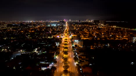 night drone hyperlapse view over illuminated main road national route 1, da nang