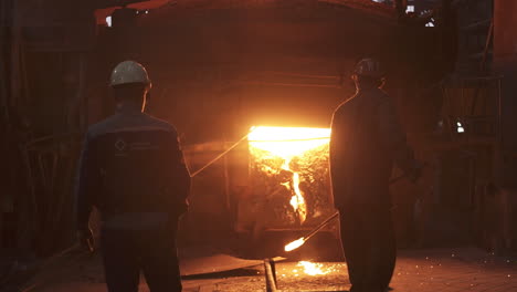 steel production facility with workers