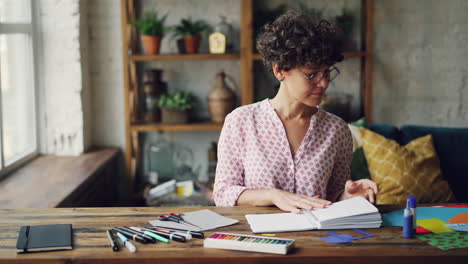 woman creating a craft project at home