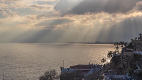 rays and clouds over the mountains of antalya, turkey