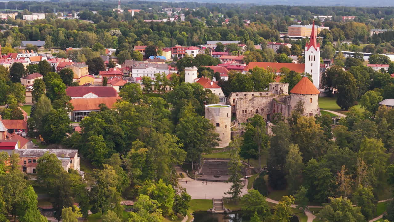Historic Landmarks: Cesis Castle And The Transfiguration of Christ Orthodox Church In Latvia., Europe.