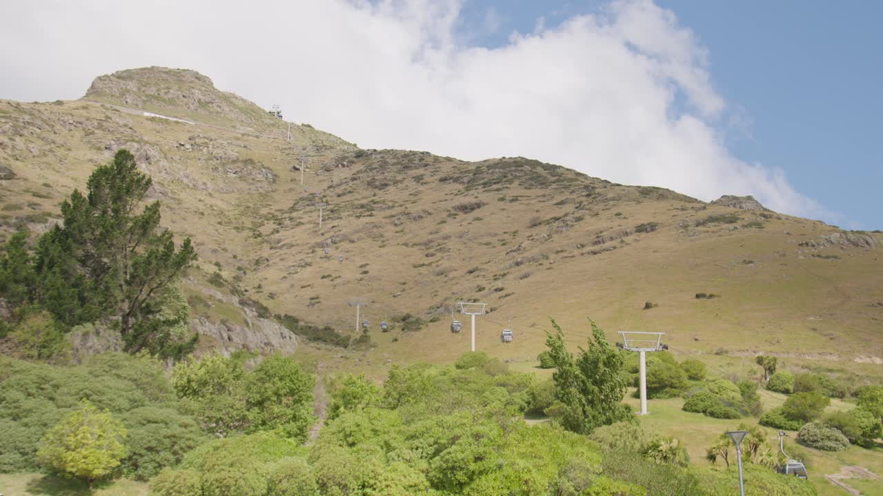 A low, wide angle shot on the Gondola ascending Mount Cavendish in Christchurch, New Zealand