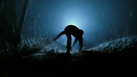 Mysterious Figure Digging in the Dark