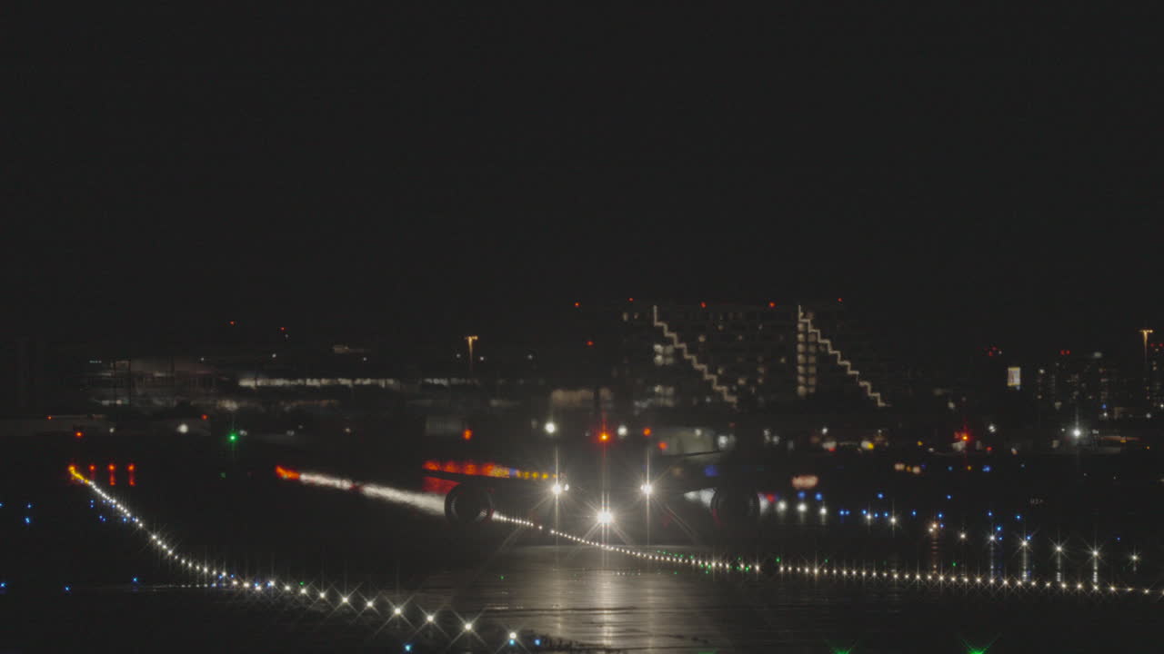 Silhouette of a big airliner taking off from Toronto Pearson International Airport at night
