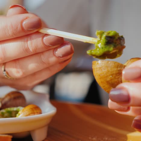 tourists taste cooked snails