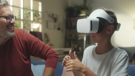 father and son exploring virtual reality together