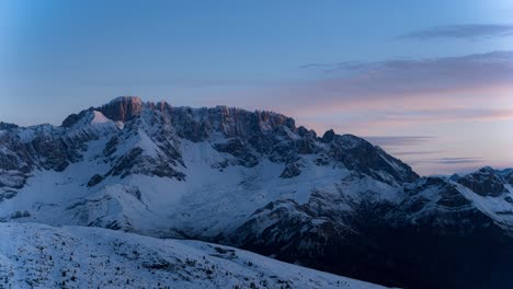 epic winter wide view morning sunrise timelapse over the snowy mountains in italy