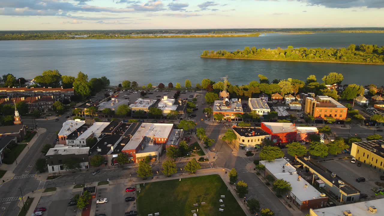 Vibrant cozy downtown Wyandotte in Michigan, Detroit river in background, aerial view
