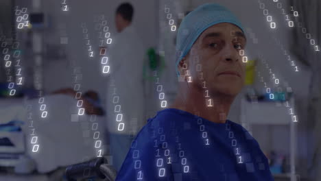 Mature patient sitting in wheelchair in hospital while doctor adjusting monitor with binary overlay