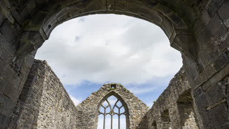 Motion-time-lapse-of-Creevelea-Abbey-medieval-ruin-in-county-Leitrim-in-Ireland-as-a-historical-sightseeing-landmark-with-dramatic-clouds-in-the-sky