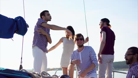 friends having fun on a yacht