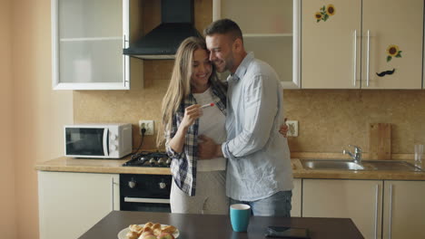 happy couple discovering pregnancy