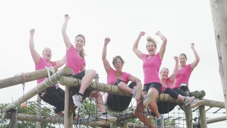 female friends enjoying exercising at boot camp together