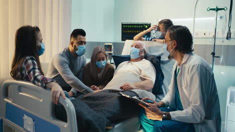 Doctor Explains Health Status to Family Visiting Elderly Patient in Hospital