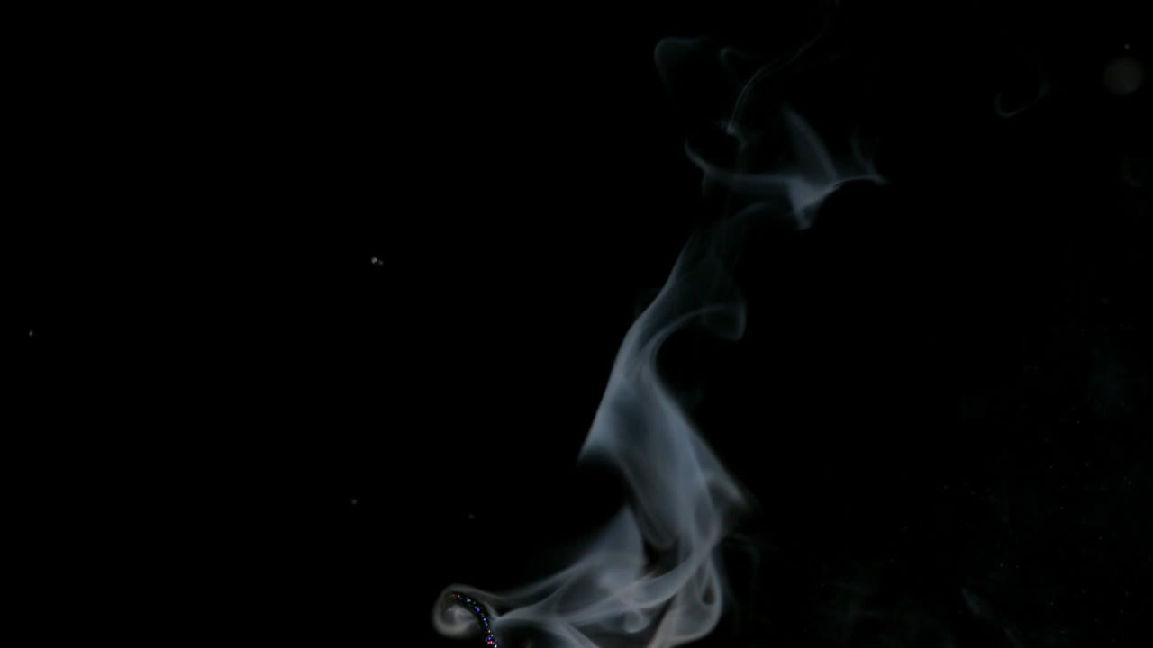 Premium stock video Arrow shooting through a flame