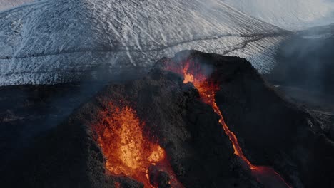 above spatter cone volcano erupting in iceland hotspot, fagradalsfjall